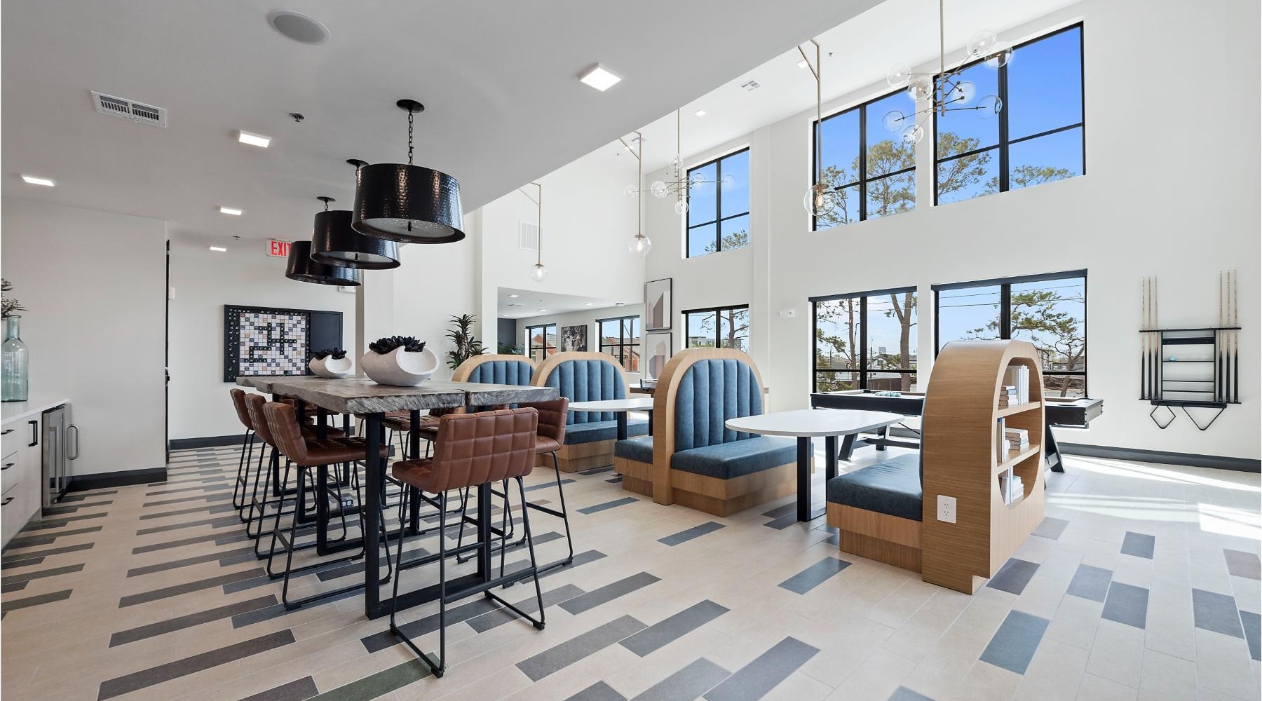 a bright room with tables and chairs